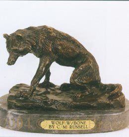 Wolf with Bone bronze by Charles Russell