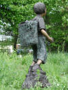 Boy Carrying Grape Basket bronze sculpture