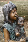 Girl with Teddy Bear on stool bronze statue
