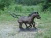 Two Horses bronze sculpture table with glass