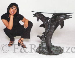 Bronze three dolphins table with glass by Castano
