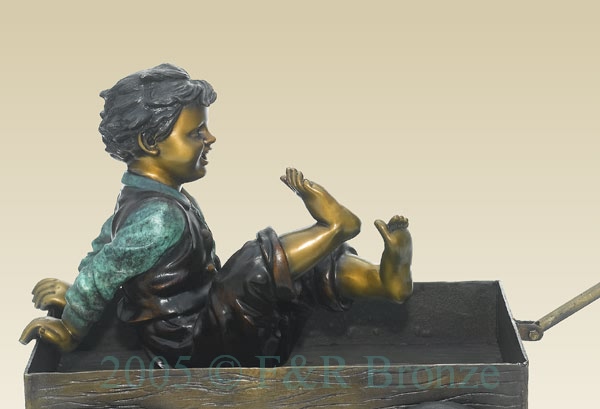 Pulling the Wagon bronze sculpture