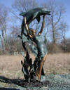 Lady with Dolphin Jumping Overhead bronze reproduction