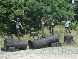 Four Kids On  Log with a dog bronze statue
