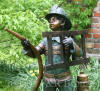 Firefighter Boy Fountain bronze statue