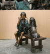 Playing Doctor Bronze statue