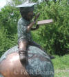 Boy Reading on Globe bronze