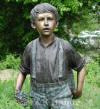 Boy Carrying Grape Basket bronze