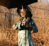 Girl with Umbrella bronze