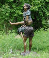 Boy & Girl Playing Leapfrog bronze