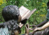 Kids on Bench Reading Bronze
