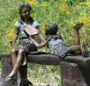 Kids on Bench Reading Bronze sculpture