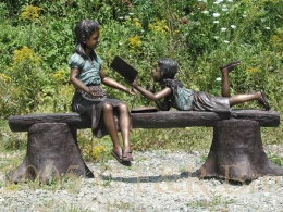 Two Girls Reading on Bench Bronze