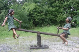 Boy & Girl on Seesaw bronze