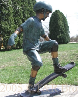 Boy Skateboarding bronze statue