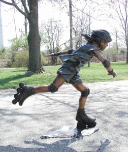 Rollerblading Girl bronze statue