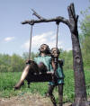 Kids Swinging bronze sculpture