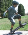 Boy Skateboarding bronze statue