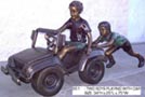 Two Boys Playing with Car bronze sculpture